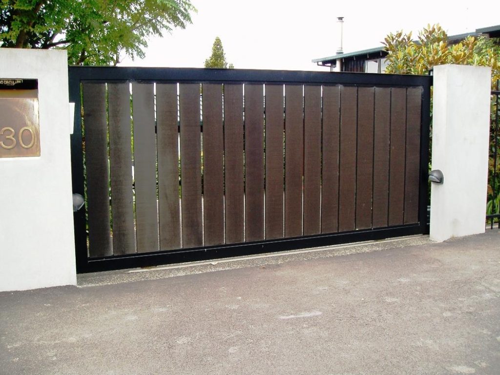 17 Irresistible Wooden Gate Designs To Adorn Your Exterior