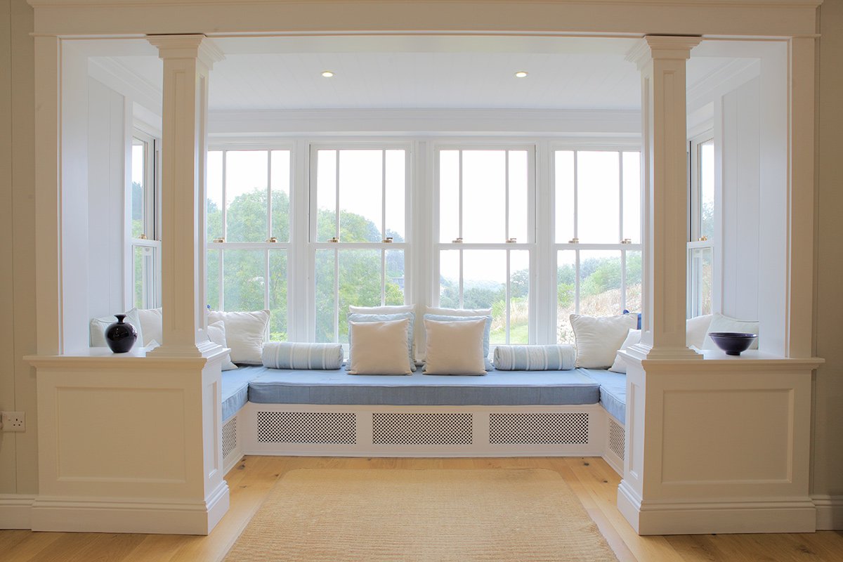 Living Room With Built In Window Seats