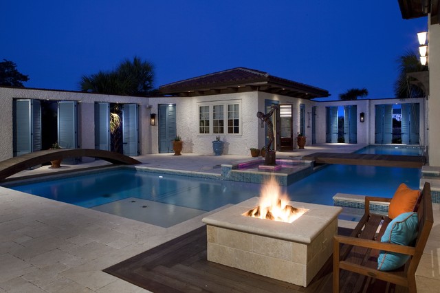 20-sophisticated-outdoor-fire-pit-designs-near-the-swimming-pool