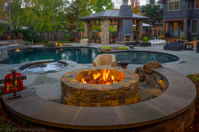 20 Sophisticated Outdoor Fire Pit Designs Near The Swimming Pool