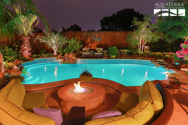 20 Sophisticated Outdoor Fire Pit Designs Near The Swimming Pool