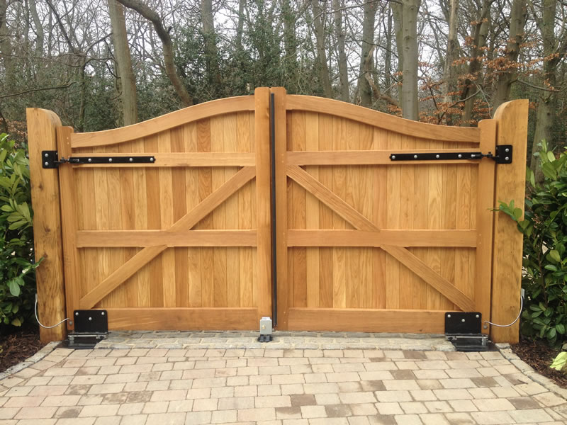 17 Irresistible Wooden Gate Designs To Adorn Your Exterior