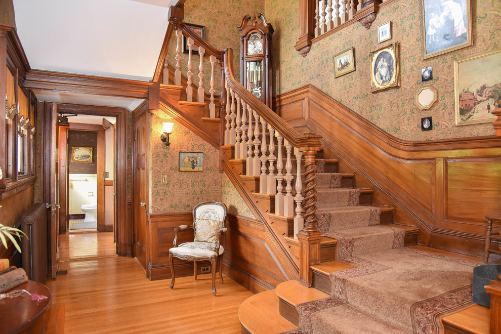 staircase overlooking living room victorian