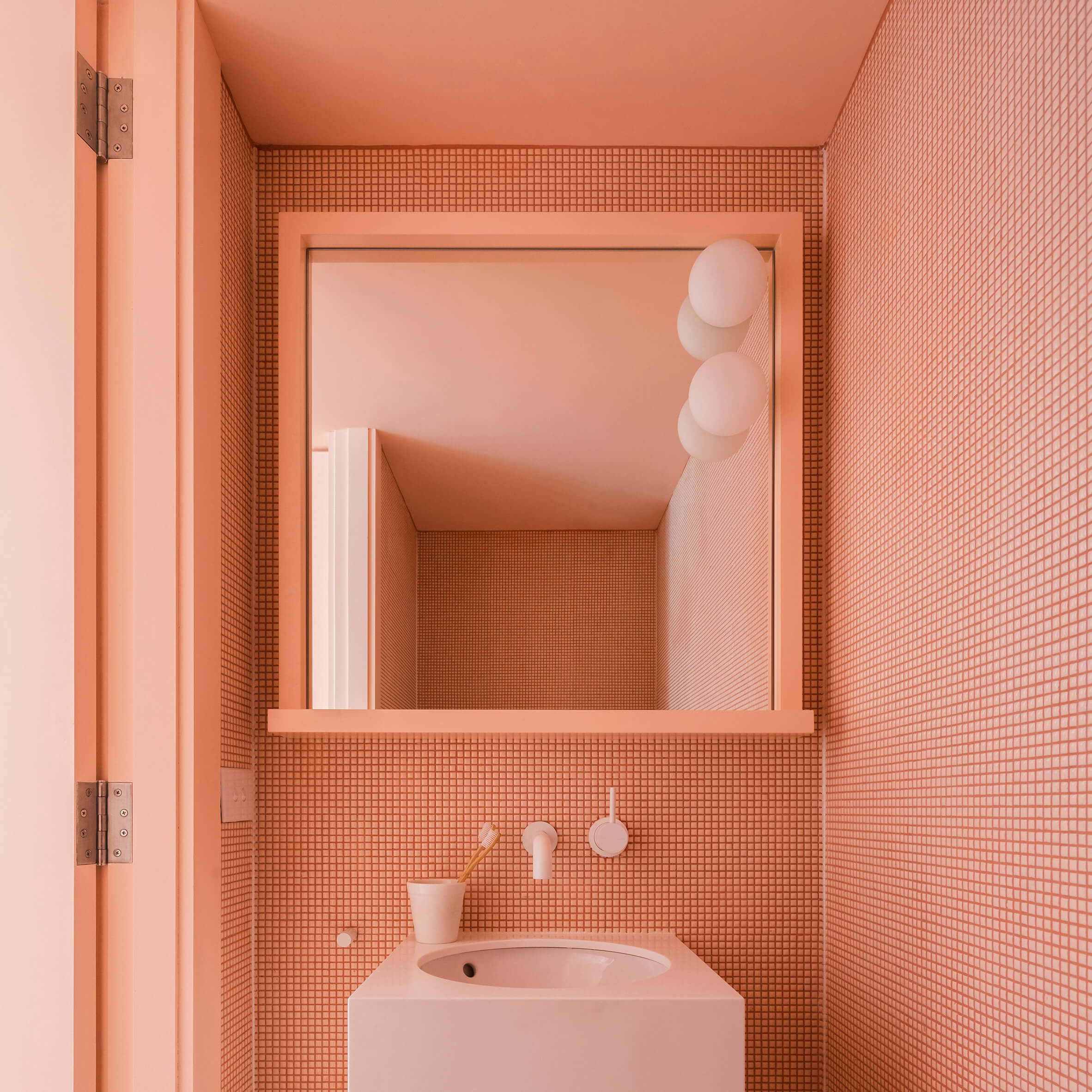 Coral and grey bathroom