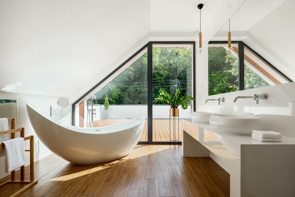 Nine Bathroom Remodel Trends for 2021 - FreestanDing Soaking Tub As Popular Bathroom Design TrenD 2021